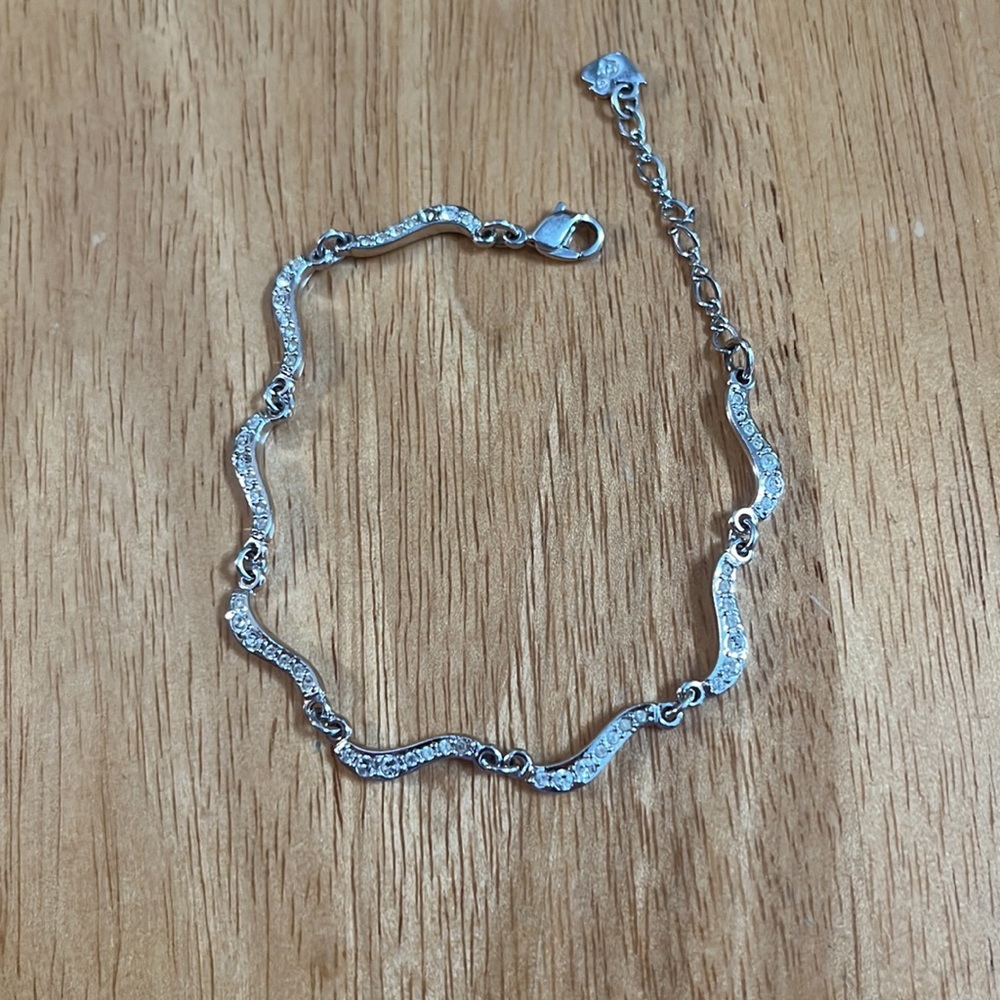 Swarovski crystal bracelet. Missing one stone. See photo.